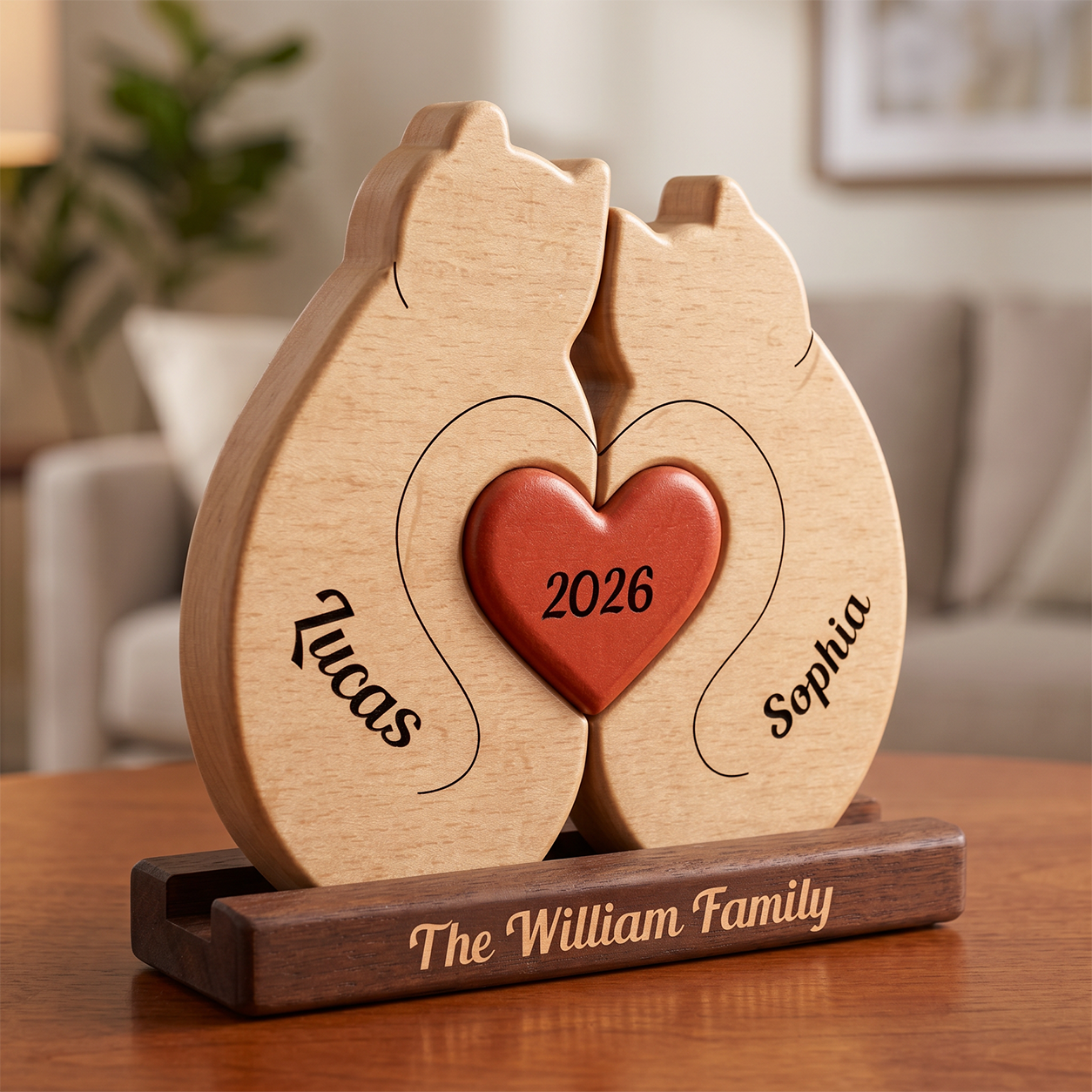 Wooden heart-shaped puzzle with engraved names and year, placed on a wooden stand in a living room setting.