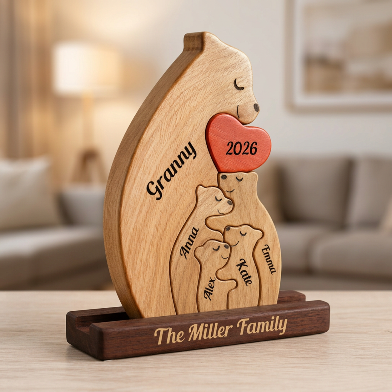 Wooden family figurine with engraved names and year, placed on a wooden stand.