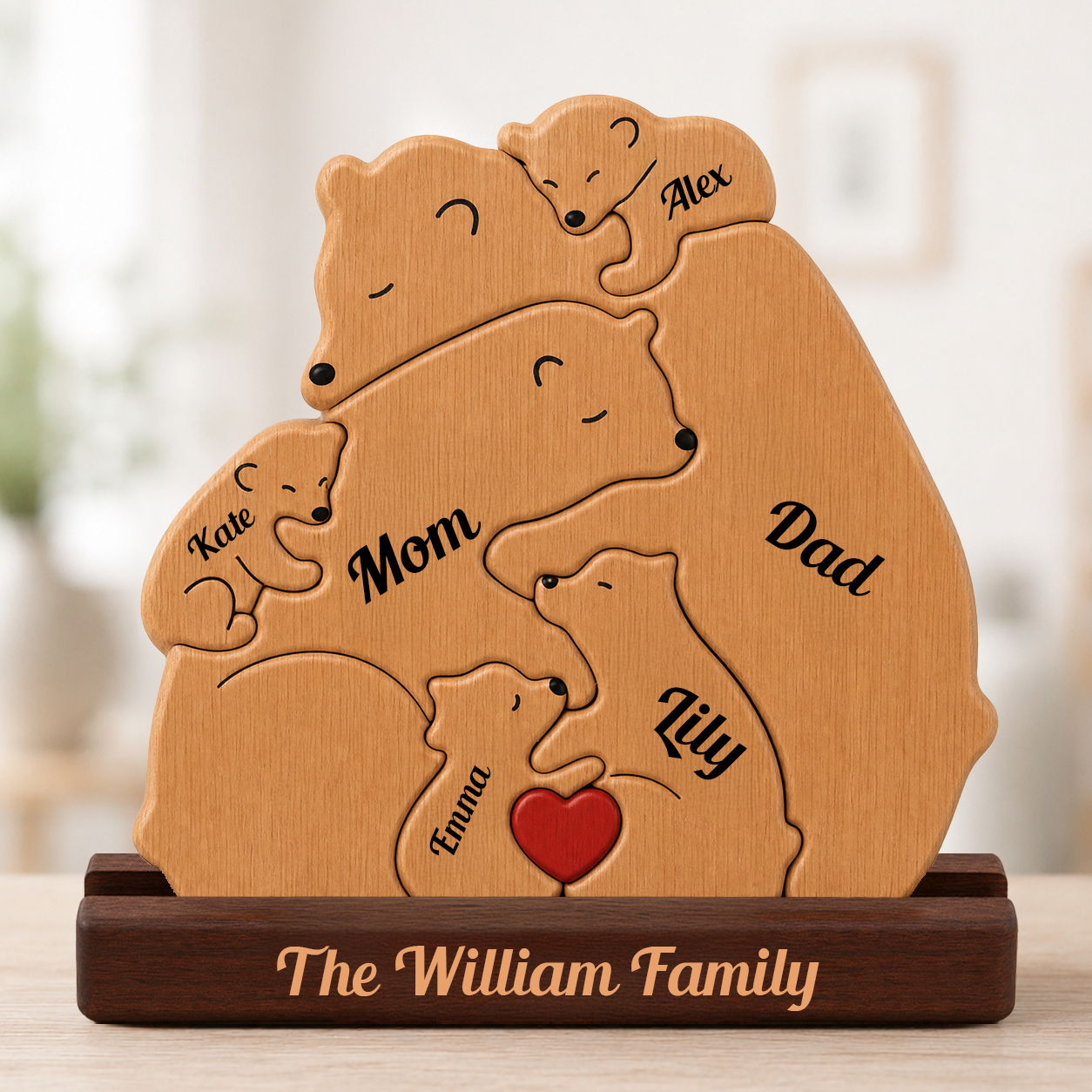 Wooden family puzzle with engraved names on a blurred background
