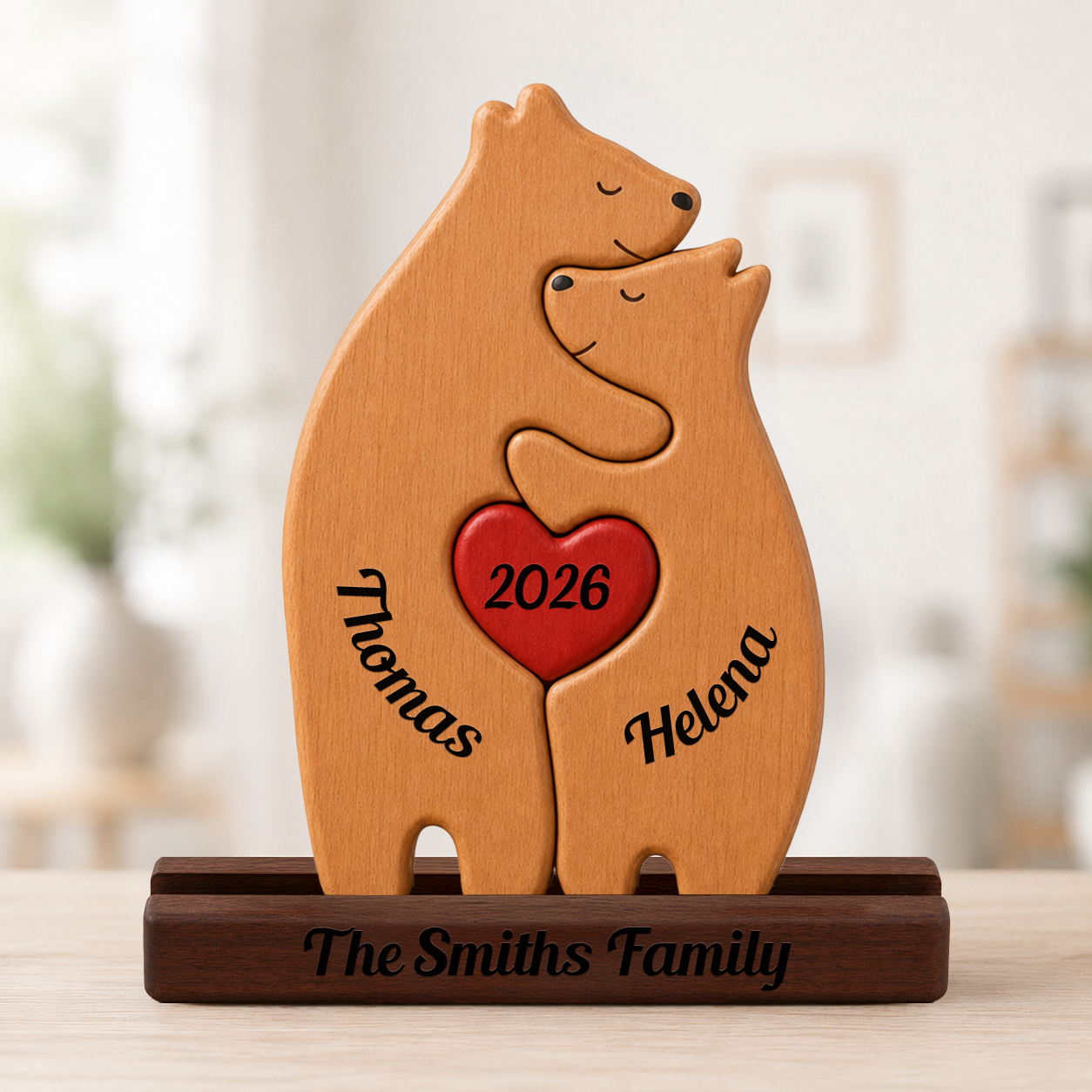 Wooden bear-shaped with Family name engraved, on a blurred background.