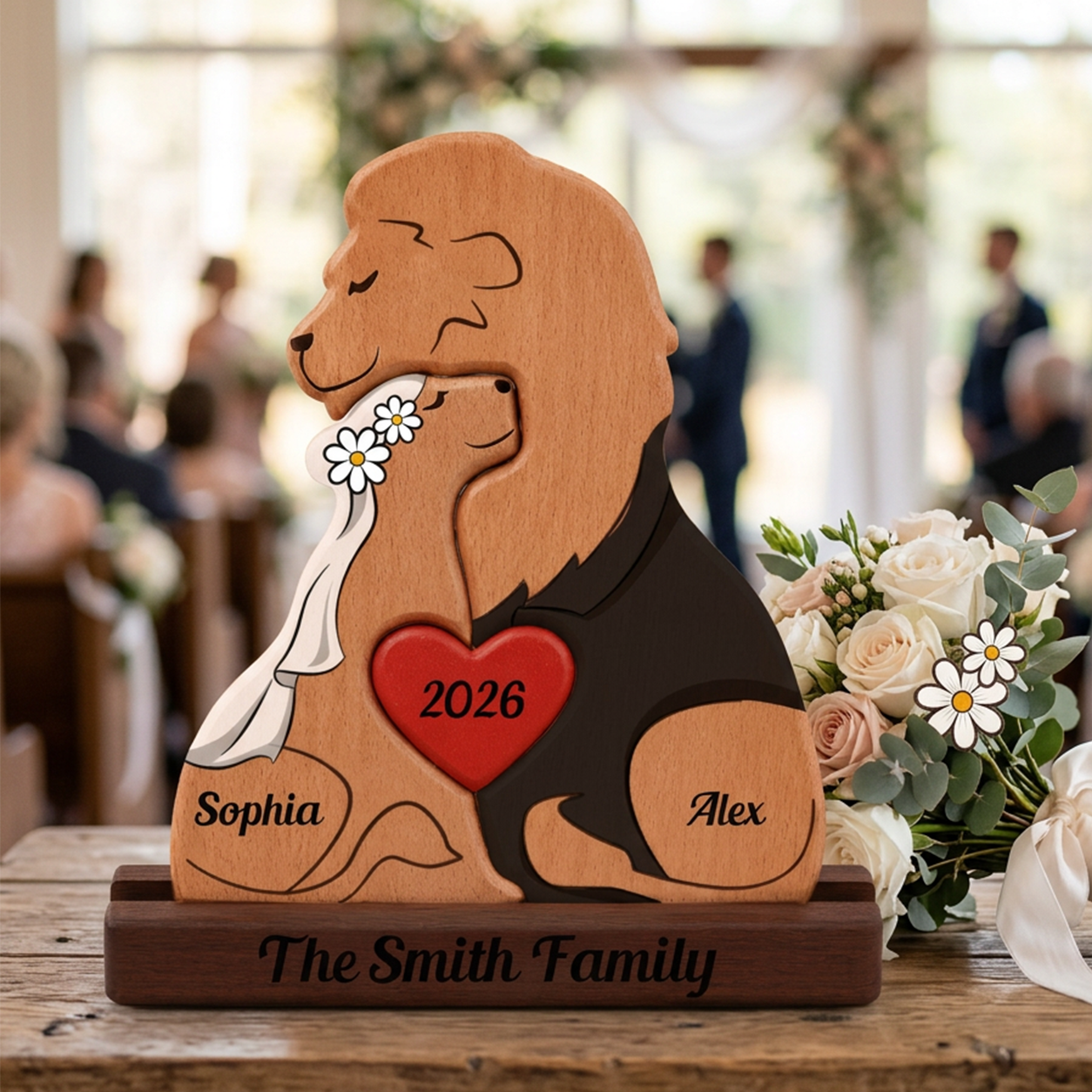 Wooden lions and names on a wooden base, surrounded by flowers.