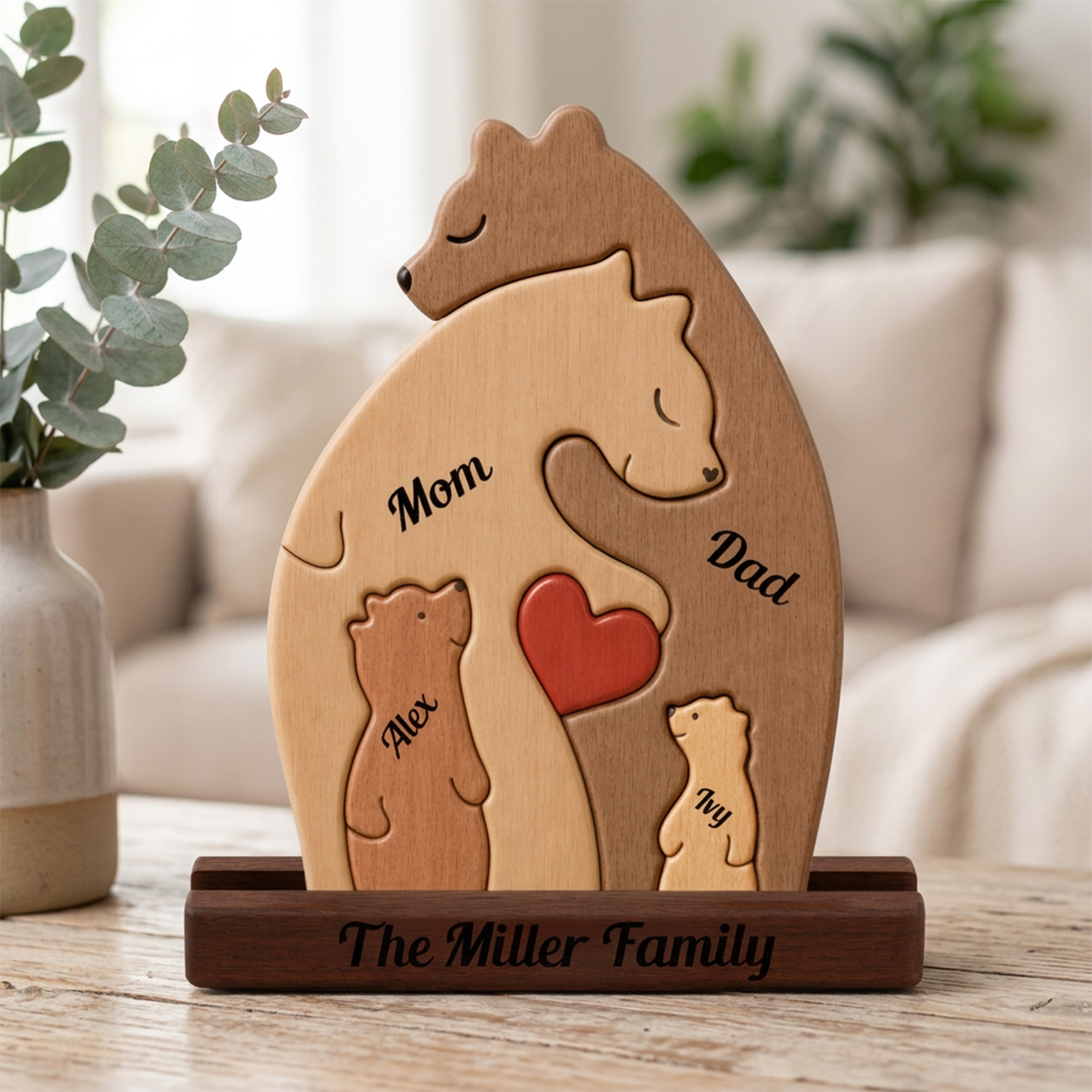 Wooden family portrait with bears and a heart, personalized with 'The Family', on a wooden stand.