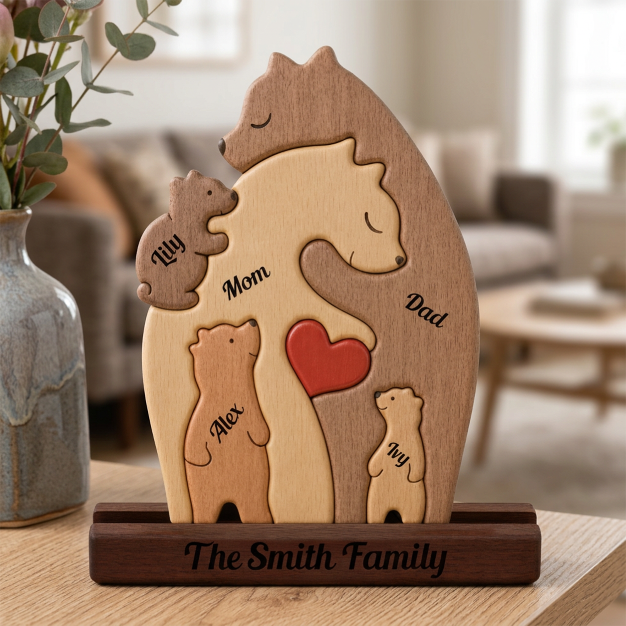 Wooden family figurine with 'The Family' on a blurred background